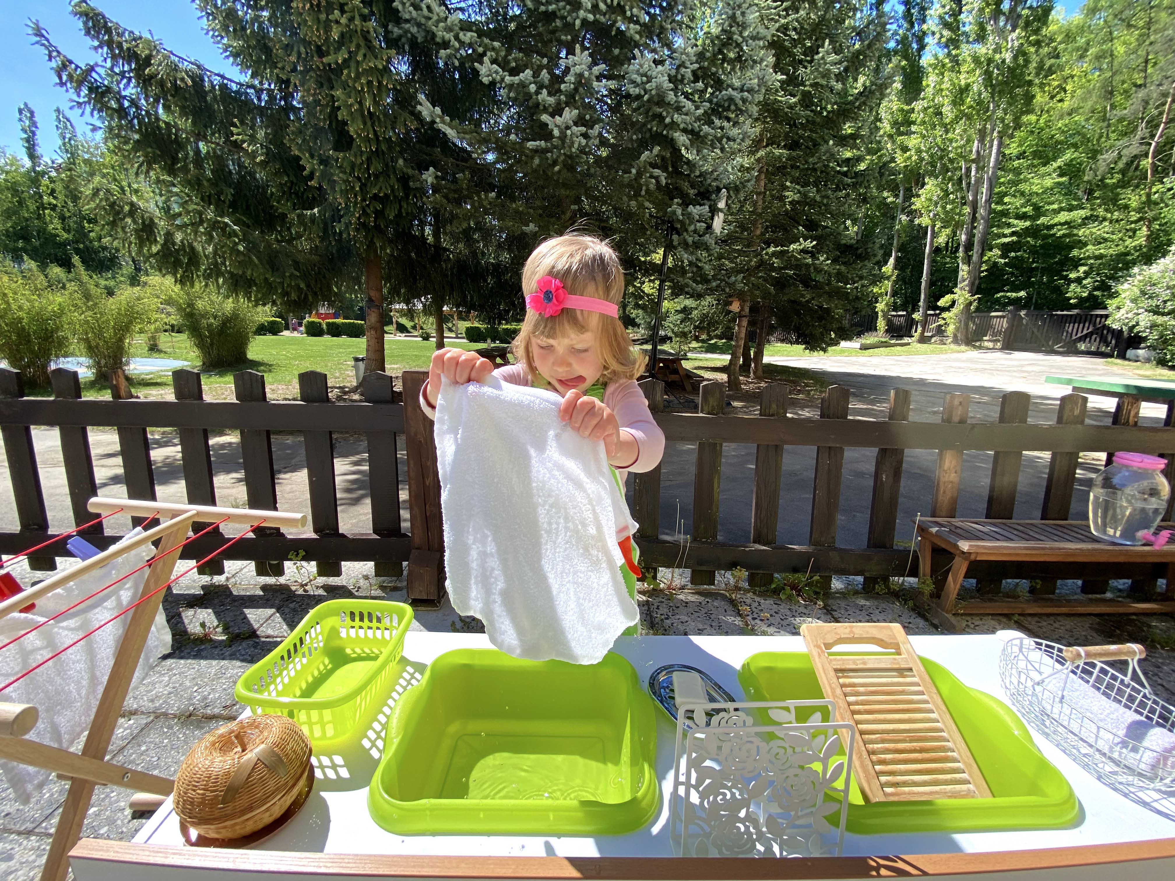 Montessori toddler practising independence