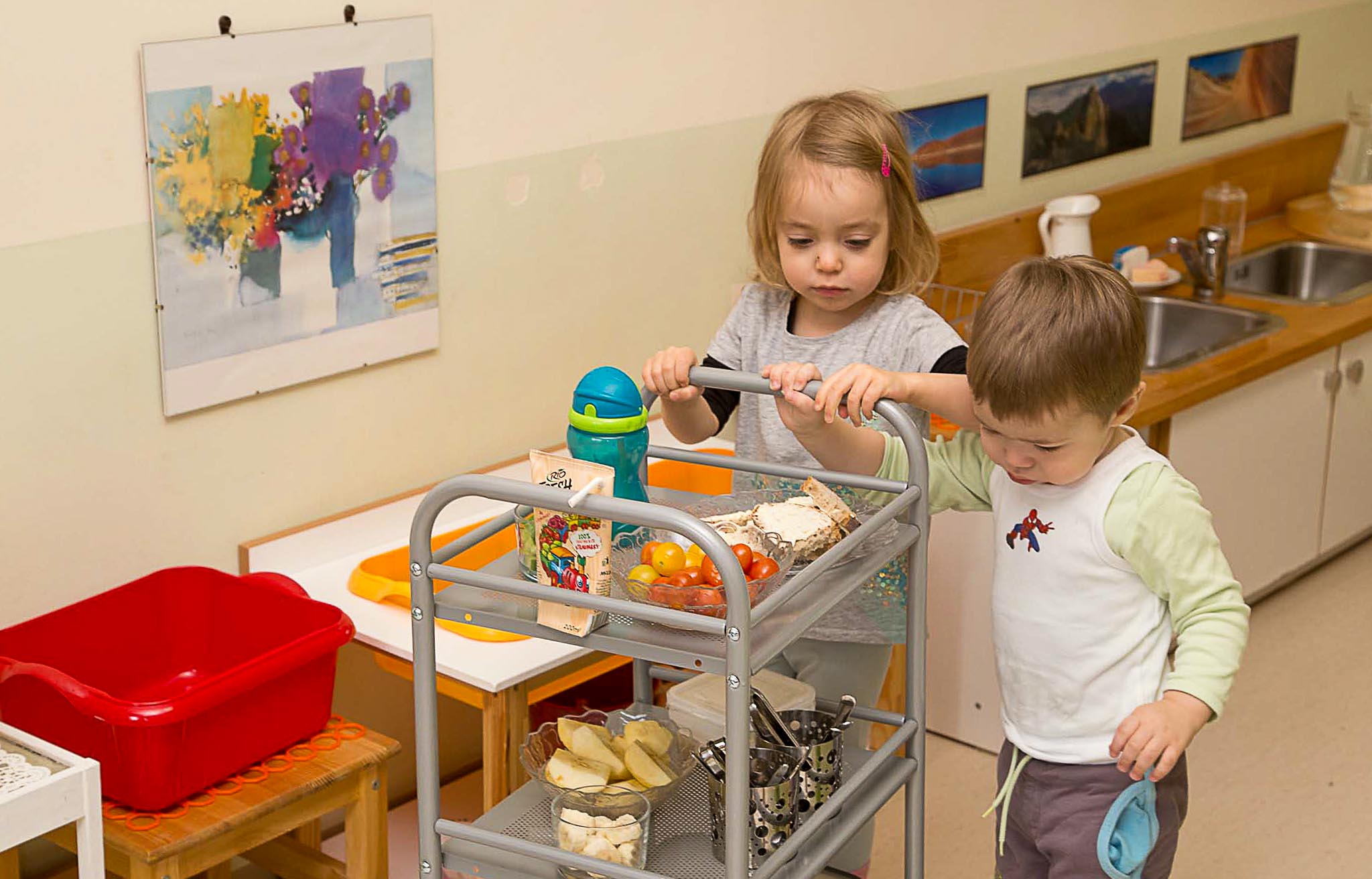 Carrying staff with toddlers - Montessori child care 