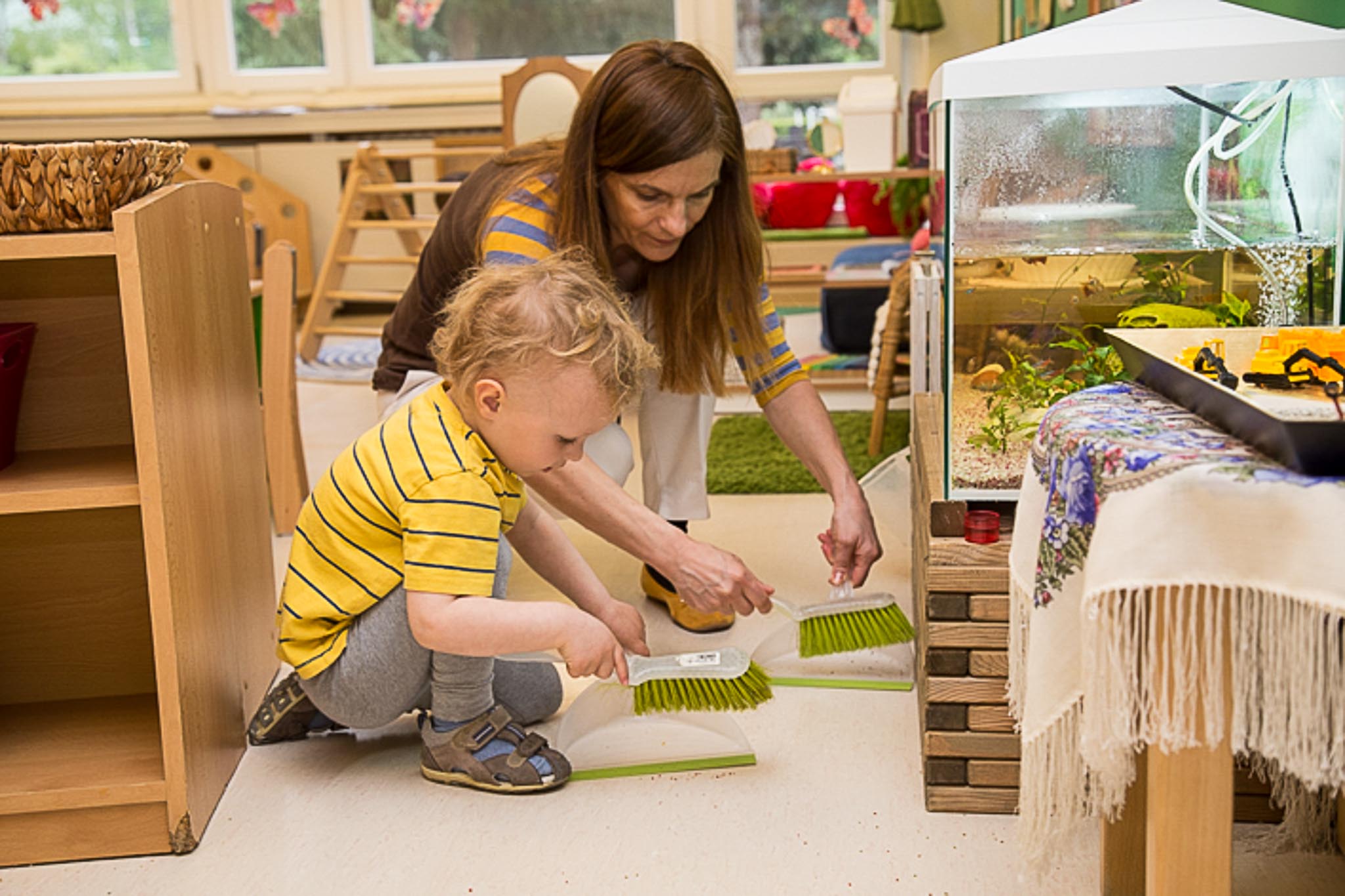 Sweeping with toddlers - Montessori nursery